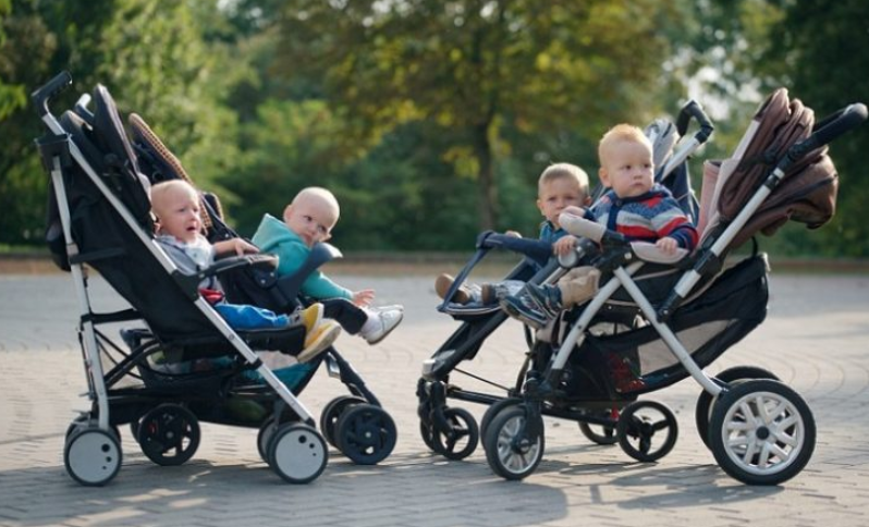 babystroller_double the two double strollers with 4 babies on it